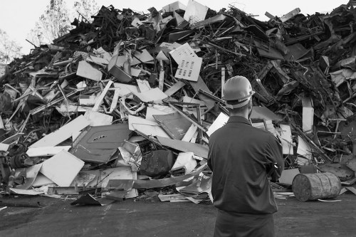 Builders managing waste on a construction site